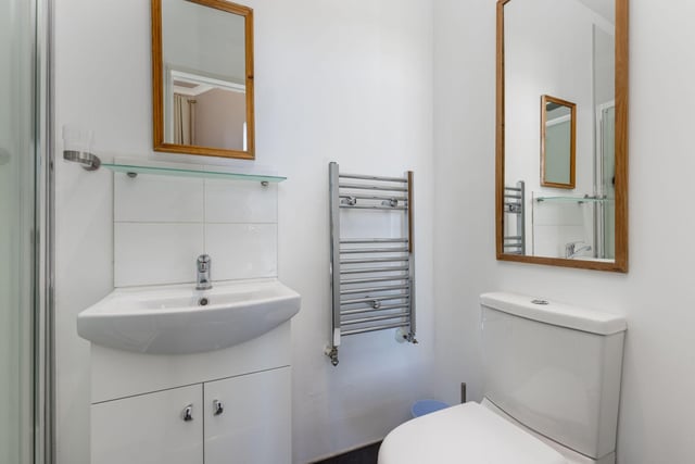 Two of the bedrooms include a modern en-suite bathroom. In addition there is an additional bathroom with a white three-piece suite with a watering can shower over the bath