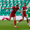 Paul McGinn gets a foot in to prevent Ryan Hedges from having a chance on goal