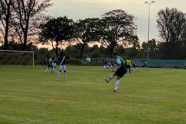 Jayden Fairley takes a free kick during the first half of Hibs' 5-3 win against Civil Service Strollers