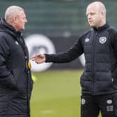 Steven Naismith talks things over with Frankie McAvoy at Hearts training on Thursday. Picture: SNS
