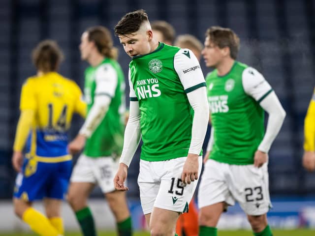 Kevin Nisbet is dejected at full time of the Betfred Cup semi-final between Hibs and St Johnstone