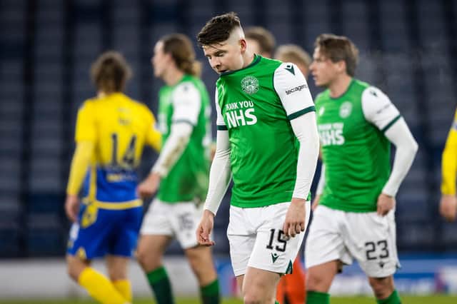 Kevin Nisbet is dejected at full time of the Betfred Cup semi-final between Hibs and St Johnstone