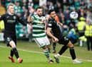 Ewan Henderson and CJ Egan-Riley combine to block out Celtic's Sead Hakšabanović during the 3-1 defeat at Parkhead