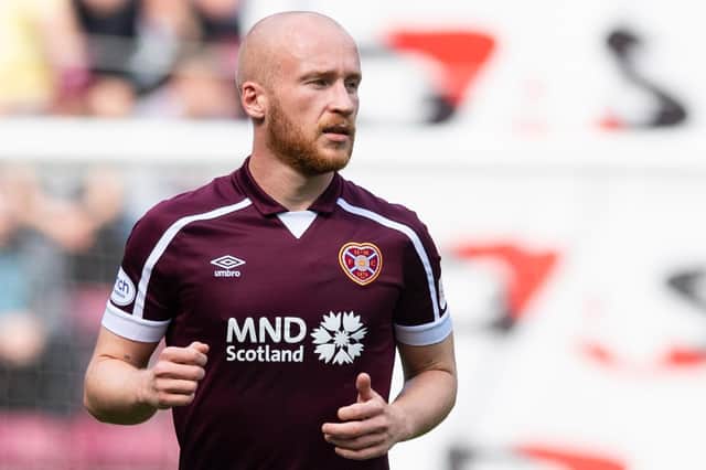 Hearts striker Liam Boyce limped off injured against Dundee.