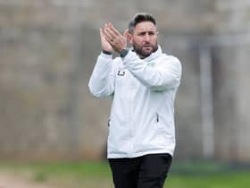 Hibs boss Lee Johnson applauds the away fans after the 1-1 draw with St Johnstone at McDiarmid Park