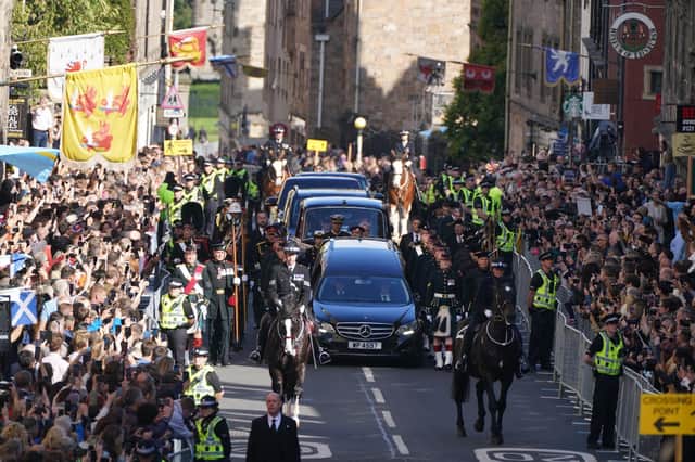 King Charles III and members of the royal family join the procession of Queen Elizabeth's coffin from the Palace of Holyroodhouse to St Giles' Cathedral, Edinburgh.Picture date: Monday September 12, 2022.