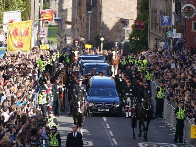 King Charles III and members of the royal family join the procession of Queen Elizabeth's coffin from the Palace of Holyroodhouse to St Giles' Cathedral, Edinburgh.Picture date: Monday September 12, 2022.