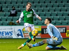 Dundee United goalkeeper Benjamin Siegrist saves an effort from Hibs striker Christian Doidge during their sides' draw at Easter Road. Photo by Ross Parker / SNS Group