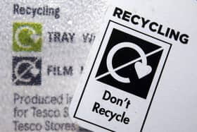 A 'Don't Recycle' label on plastic packaging.