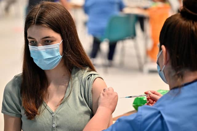 Health service staff and others who have been helping inoculate the nation should be replaced by a dedicated team of vaccinators (Picture: Jeff J Mitchell/pool/AFP via Getty Images)
