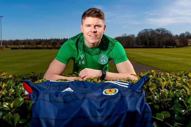 Kevin Nisbet celebrates his maiden Scotland call-up at the Hibernian Training Centre