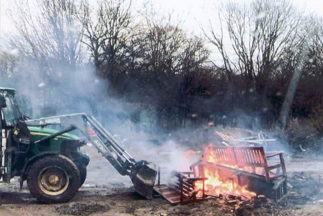 Memorial benches from Edinburgh's Princes Street Gardens are burned at a facility on the outskirts of the city.