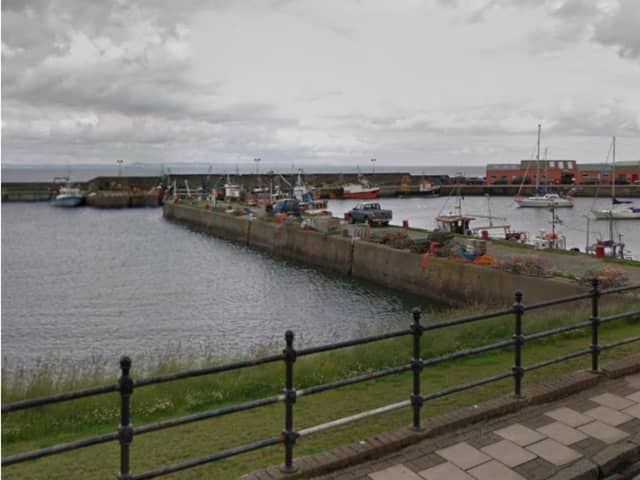 Woman rescued after falling off Harbour wall into the water in East Lothian
