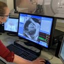 NHS Forth Valley Consultant Radiologist, Dr Lindsey Norton reviews a cardiac MRI scan.
