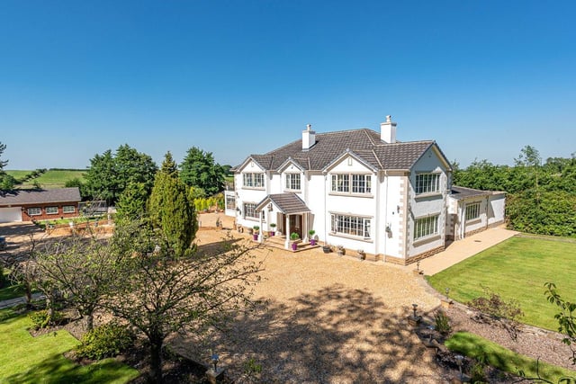 This substantial family home extends across approximately 8000 sq ft and is nestled amid three acres of manicured gardens and paddock land, with modern fittings throughout. GBP: 2,500,000