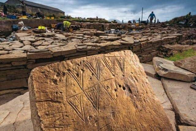 A decorative stone incised with a geometric motif at Ness of Brodgar. Picture: Jim Richardson/National Geographic