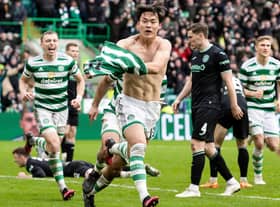 Oh Hyeon-gyu celebrates after scoring to put Celtic 2-1 up against ten-man Hibs at Celtic Park. Picture: SNS