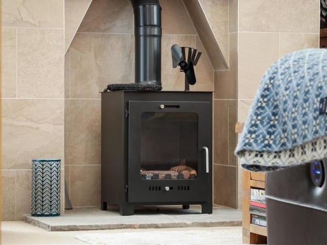 Moving into the lounge or living room now, and the highlight is this feature fireplace. Imagine relaxing in front of the fire on a cold winter's evening.