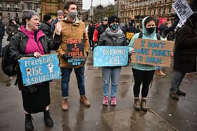 Campaigners attend a rally in George Square in protest against the rising cost of living.