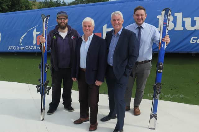Pictured from left to right at Hillend at the new funslope are: Hillend Duty Officer Mike Ronald, Cabinet Member for Economic Development Councillor Russell Imrie, and Project Managers Paul Campbell and Andrew Souter.