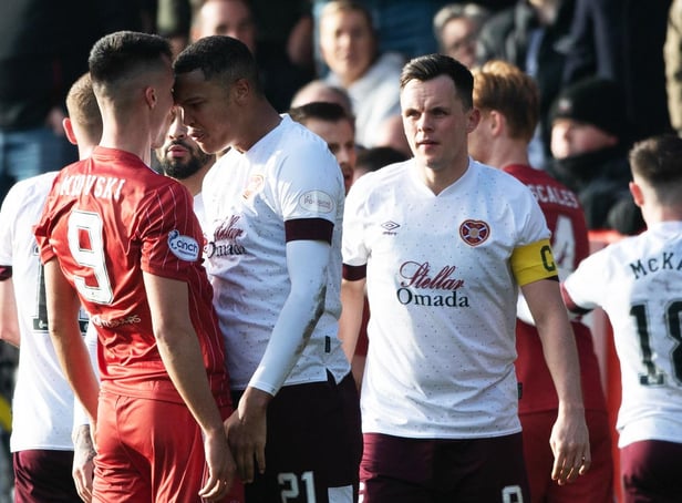 Toby Sibbick and Bojan Miovski after the James Hill tackle on Duk and subsequent reaction. Four players were booked. Picture: Paul Devlin / SNS