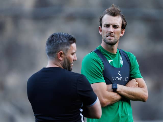 Christian Doidge with manager Lee Johnson in training ahead of Hibs' first leg match with Andorran side Inter Club d'Escaldes last month. Picture: SNS