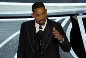 Will Smith cries as he accepts the award for best performance by an actor in a leading role for "King Richard" at the Oscars on Sunday, March 27, 2022. (Image credit: AP Photo/Chris Pizzello)