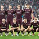 The Hearts players line up prior to kick-off at Tynecastle. Picture: SNS