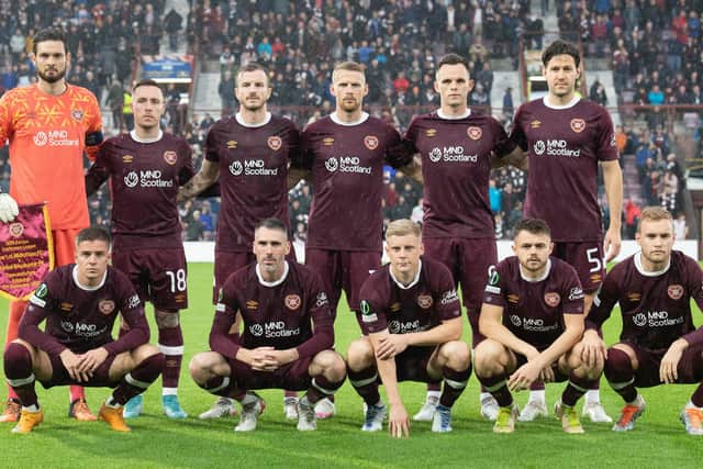 The Hearts players line up prior to kick-off at Tynecastle. Picture: SNS