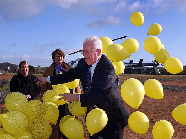 Deputy First Minister and Scottish Lib Dem leader Jim Wallace releases some yellow balloons before leaving Edinburgh on a whistle-stop two-day tour of Scotland to mark the start of his party's campaign.
The Lib Dems finished with the same number of seats and had a second term in coalition government with Labour before the SNP won power in 2007. But Mr Wallace stepped down as party leader and Deputy First Minister in 2005, to be succeeded by Nicol Stephen. Mr Wallace later became a life peer, served as Lord Advocate in the UK Conservative-Lib Dem coalition and was leader of the Lib Dems in the Lords.
