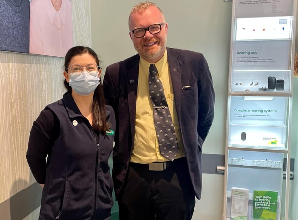 Martyn Day MP visiting Specsavers in Linlithgow.