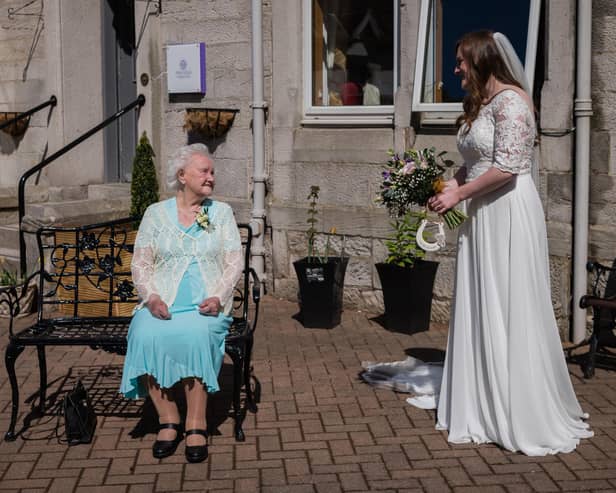Jill Morton was able to reunite with her 93-year-old granny at Mansfield Care's Pine Villa Care Home in Loanhead, on the way to her wedding.  Photo by Rachel Hein.