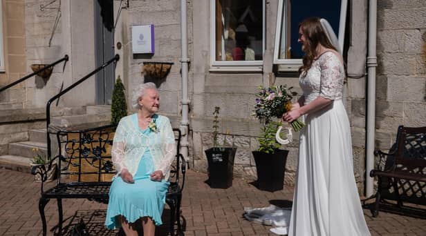 Jill Morton was able to reunite with her 93-year-old granny at Mansfield Care's Pine Villa Care Home in Loanhead, on the way to her wedding.  Photo by Rachel Hein.