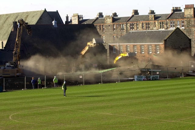 The last section of the old main stand at the home of Hibs hits the ground in 2001.