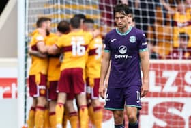 A dejected Joe Newell after Conor Wilkinson fired Hibs in front at Fir Park. Picture: SNS
