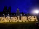 A giant Edinburgh sign has appeared on the Mound