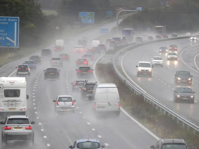 Persistent downpours are expected to bring flooding and transport disruption, with more than 20 flood alerts in place.
