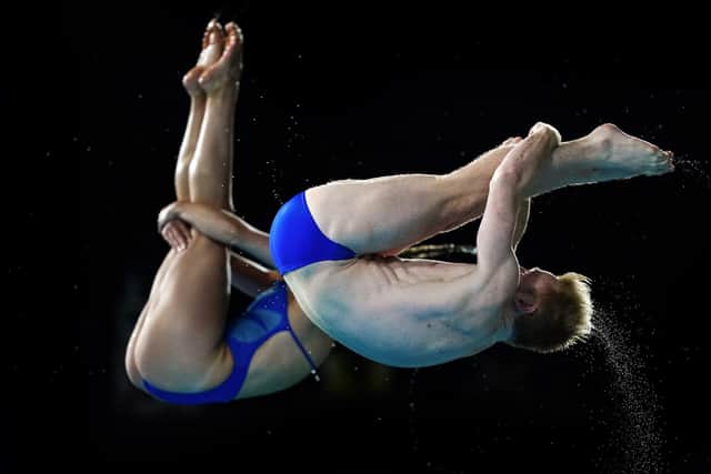 James Heatly and Grace Reid during the mixed synchronised 3m springboard final. Picture David Davies/PA