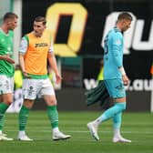 The Hibs players leave the field of play after the defeat by Livingston. Midfielder Jimmy Jeggo believes the team are conceding too many soft goals. Picture: Simon Wootton / SNS Group