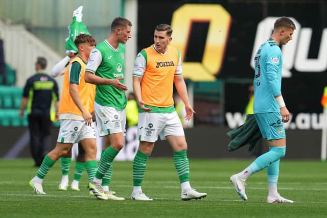 The Hibs players leave the field of play after the defeat by Livingston. Midfielder Jimmy Jeggo believes the team are conceding too many soft goals. Picture: Simon Wootton / SNS Group