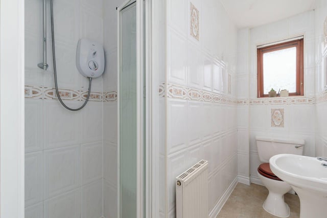 The master bedroom benefits from this en-suite shower room.