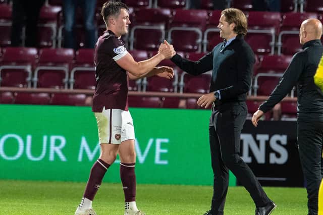 Hearts defender John Souttar and manager Robbie Neilson. (Photo by Ross Parker / SNS Group)