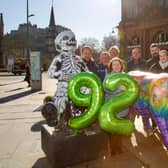 The Essential Edinburgh team celebrate the 92 per cent vote in favour of renewing the BID. From left to right: Grant Roberts, Grant Stewart, Denzil Skinner (back), Gillian James (front), Roddy Smith, PC Sanii, Emily Campbell Johnston and Mark Farvis.