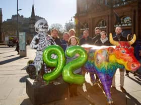 The Essential Edinburgh team celebrate the 92 per cent vote in favour of renewing the BID. From left to right: Grant Roberts, Grant Stewart, Denzil Skinner (back), Gillian James (front), Roddy Smith, PC Sanii, Emily Campbell Johnston and Mark Farvis.