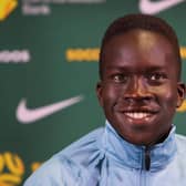 Garang Kuol has three caps for Australia after being named in the World Cup squad for Qatar and coming on against France and Argentina. Picture: Lisa Maree Williams/Getty