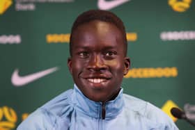 Garang Kuol has three caps for Australia after being named in the World Cup squad for Qatar and coming on against France and Argentina. Picture: Lisa Maree Williams/Getty