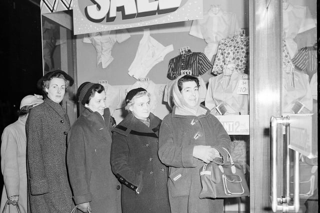 Wrapped up against the early morning cold these intrepid bargain hunters are first in the queue at Blyth's department store in Earl Grey Street, Edinburgh for the start of the January sale, 1950s.