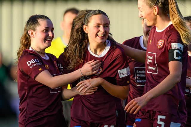 Hearts forward Aimee Anderson celebrates with her team-mates after netting a stunning winner against Hibs at the Oriam. Picture: Malcolm Mackenzie