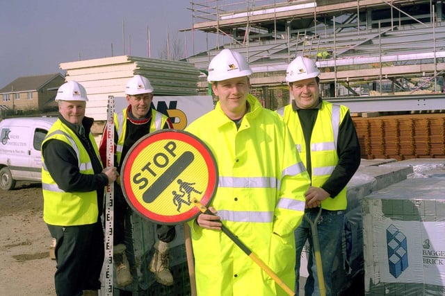 A construction worker took on the additional role of lollipop man, while work was carried out at the Norton Free School in 2003