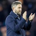 Lee Johnson applauds the Hibs fans at Rugby Park